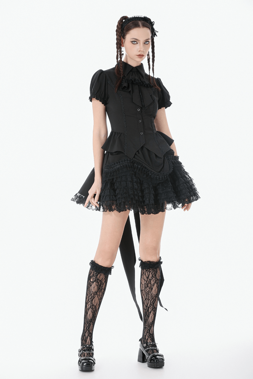 Gothic Lace-up Puff Sleeve Waist-Shaping Shirt with Bow Tie worn by model, showcasing its stylish puff sleeves and lace details.