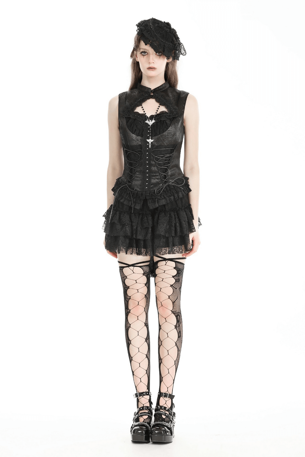 Gothic lace-up sexy black top with ruffle trim, paired with fishnet stockings and stylish accessories.