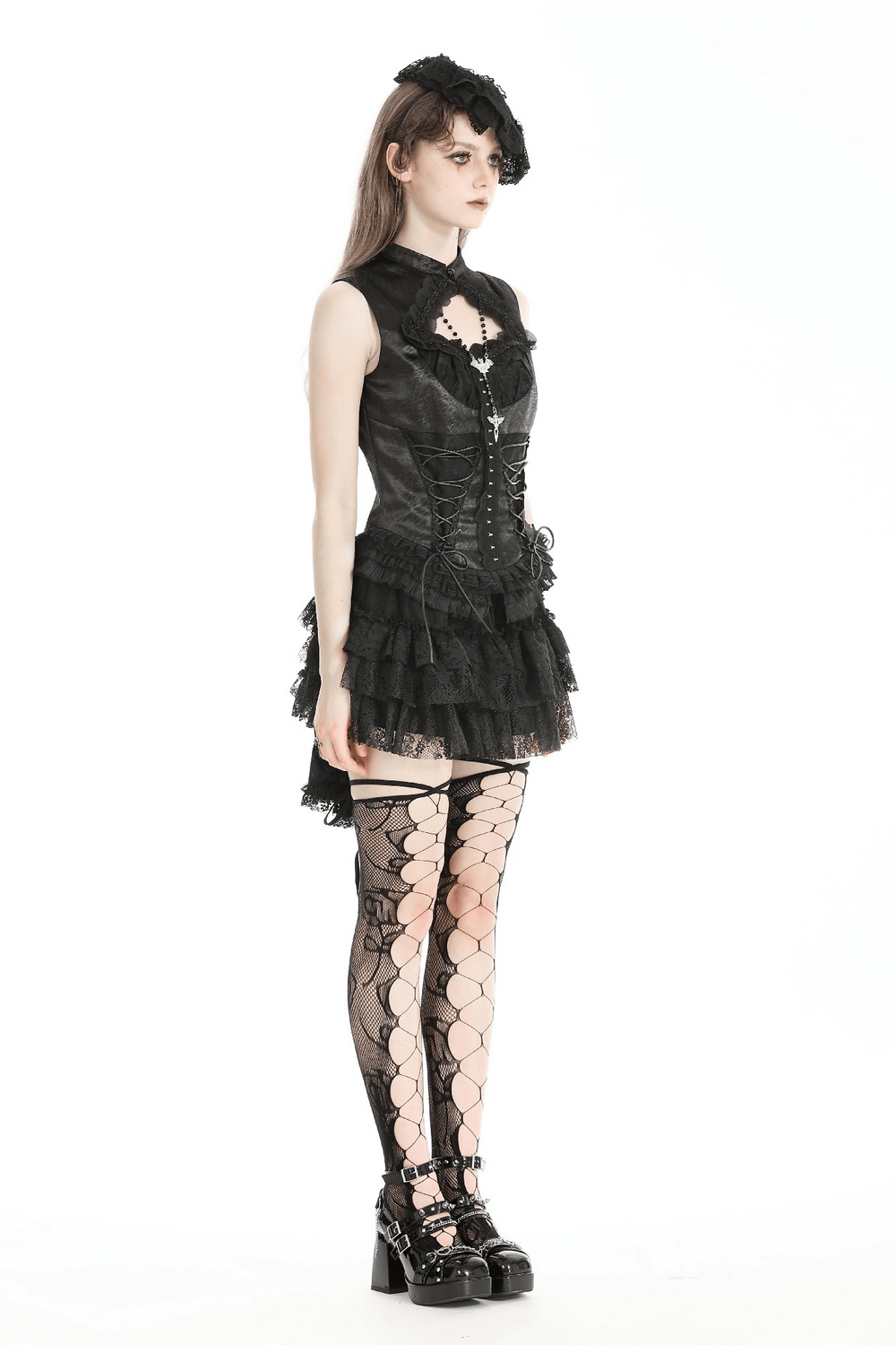 Victorian-inspired black lace-up sexy top with ruffle trim and gothic stockings, showcasing a dramatic silhouette.
