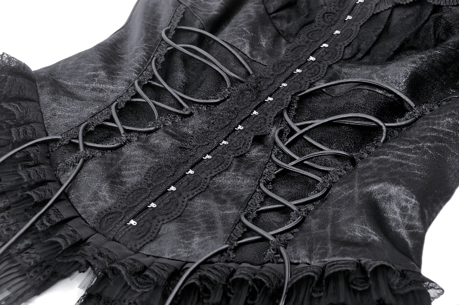 Close-up of a Gothic lace-up black top featuring intricate ruffles and delicate trim for a Victorian-inspired look.