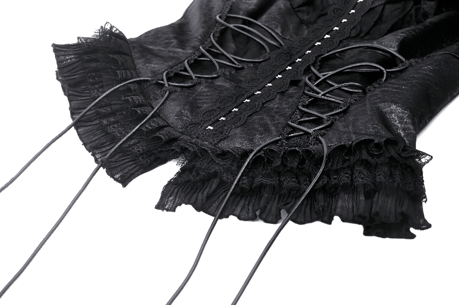 Gothic lace-up black top with ruffle trim showcasing intricate design and Victorian-inspired details.
