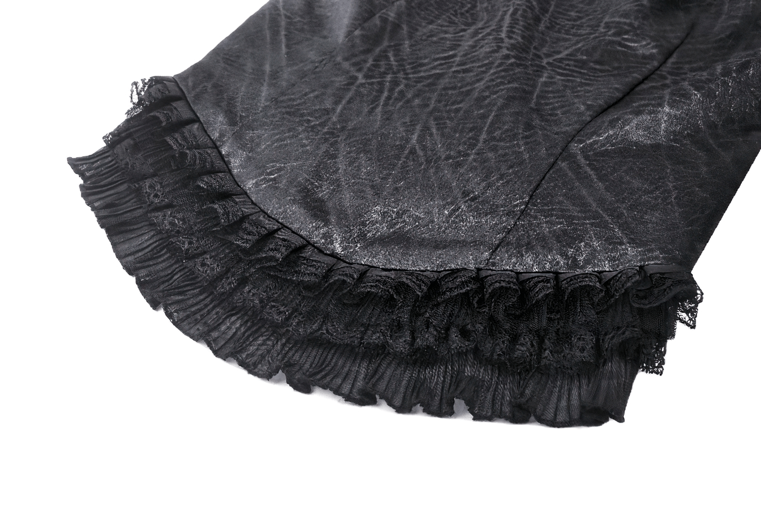 Close-up of black ruffled trim on a gothic-inspired sleeveless top, showcasing intricate lace details.