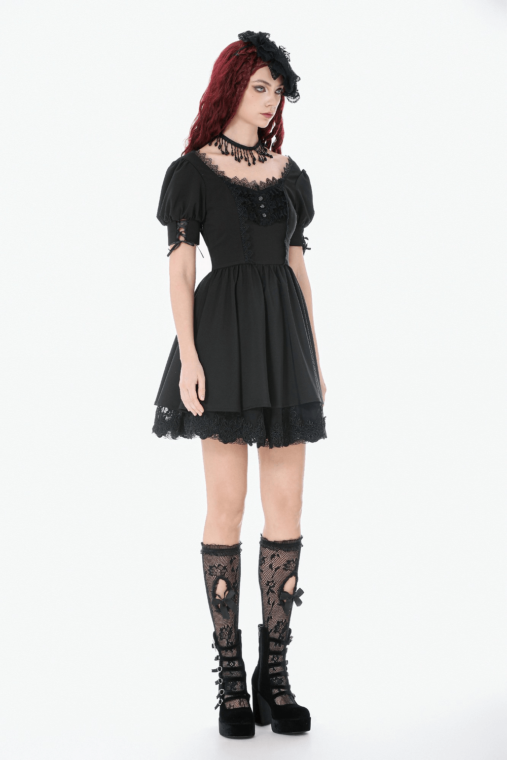 Gothic Lace-Up Short Sleeve Ruffle Dress with Corset Detail worn by a model showcasing puffed sleeves and lace accents.