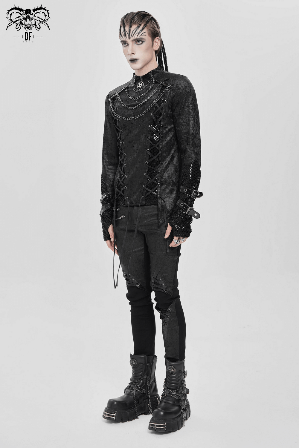 Gothic Lace-Up Top with Chains and Pentagram Pendant worn with dark pants and chunky boots, showcasing edgy style.
