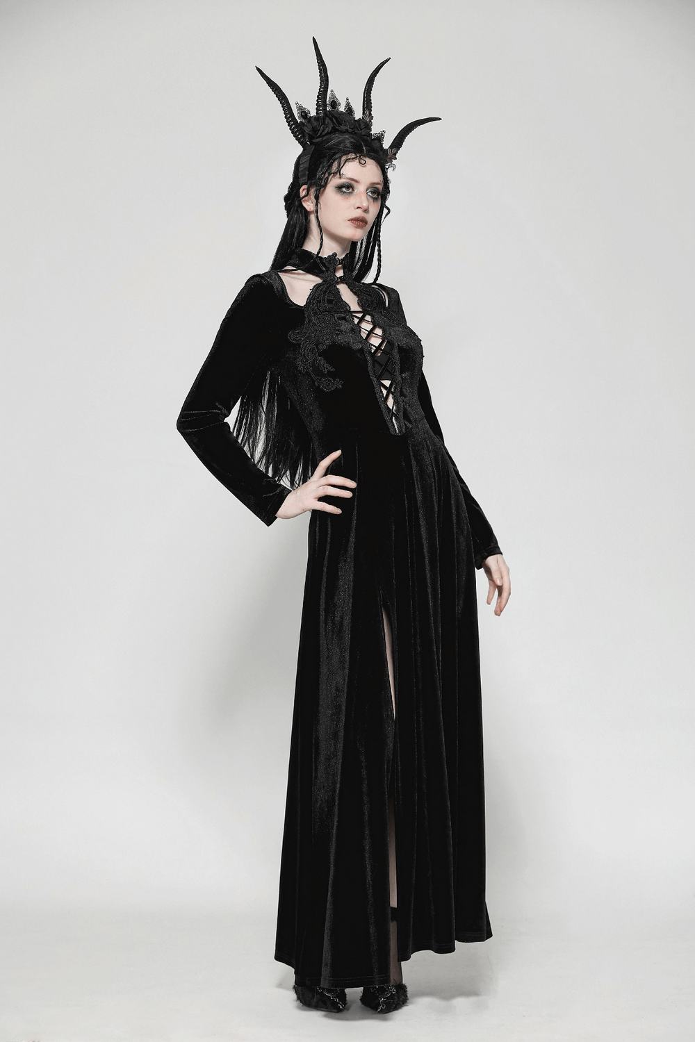 Gothic lace-up velvet dress with ruffled details and side slit, perfect for a dark, dramatic look.