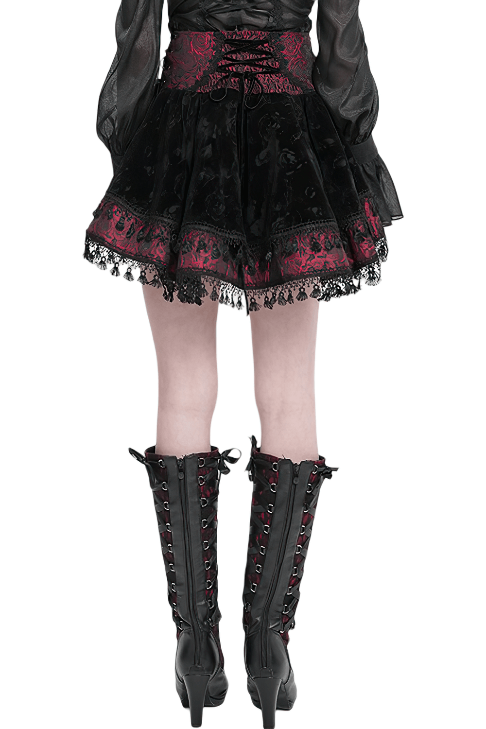 Back view of a Gothic lace-up velvet skirt with embroidered cross and lace trim, paired with black lace-up boots.