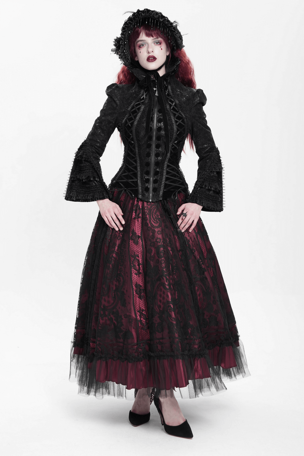 Gothic Lace-Up Victorian Jacket with Bell Sleeves and Cross model wearing a black and red gothic ensemble.