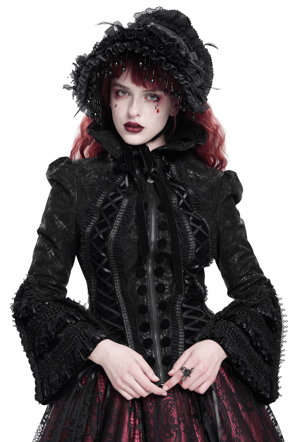 Gothic Lace-Up Victorian Jacket with Bell Sleeves and Cross detailed on model, showcasing dramatic black lace and bell sleeves.