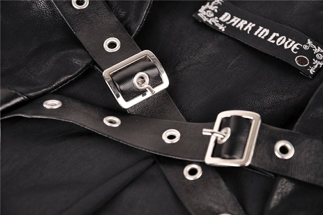 Close-up of black Gothic waistcoat buckle and lacing details, showcasing edgy design and 'Dark In Love' label.