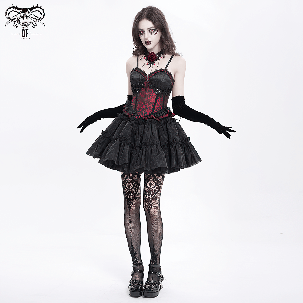 Gothic model in lace-up wine red corset with ruffle trim and black tulle skirt, showcasing dark fashion vibes.