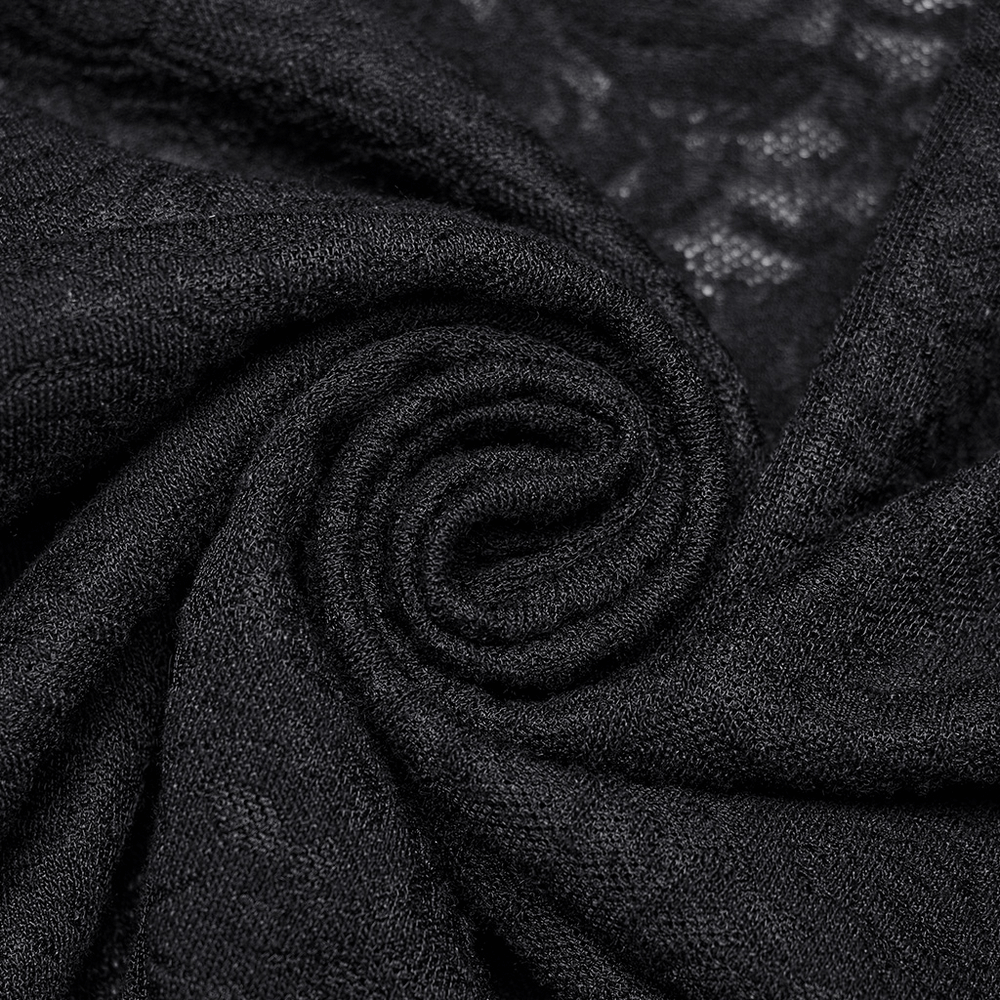 Close-up of luxurious black lace fabric, highlighting intricate texture and softness for a Gothic-inspired dress.
