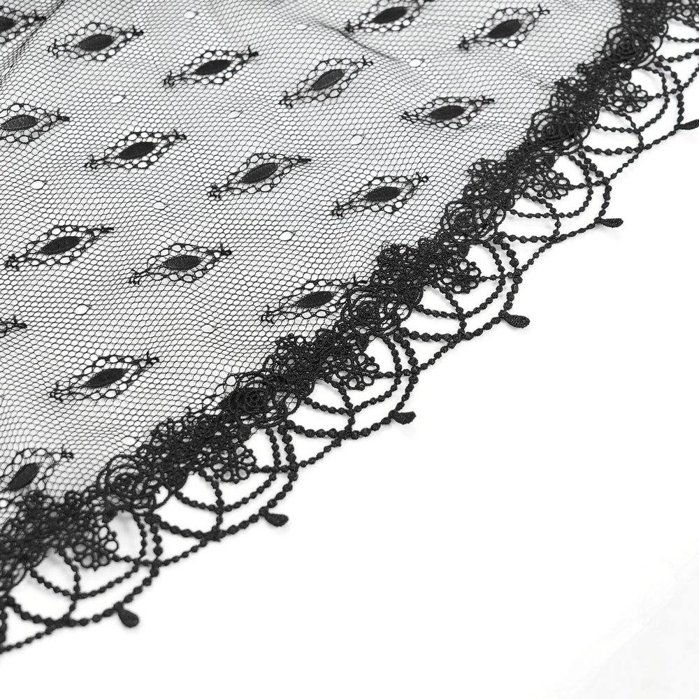 Elegant black lace fabric with intricate floral patterns and delicate scalloped edges.