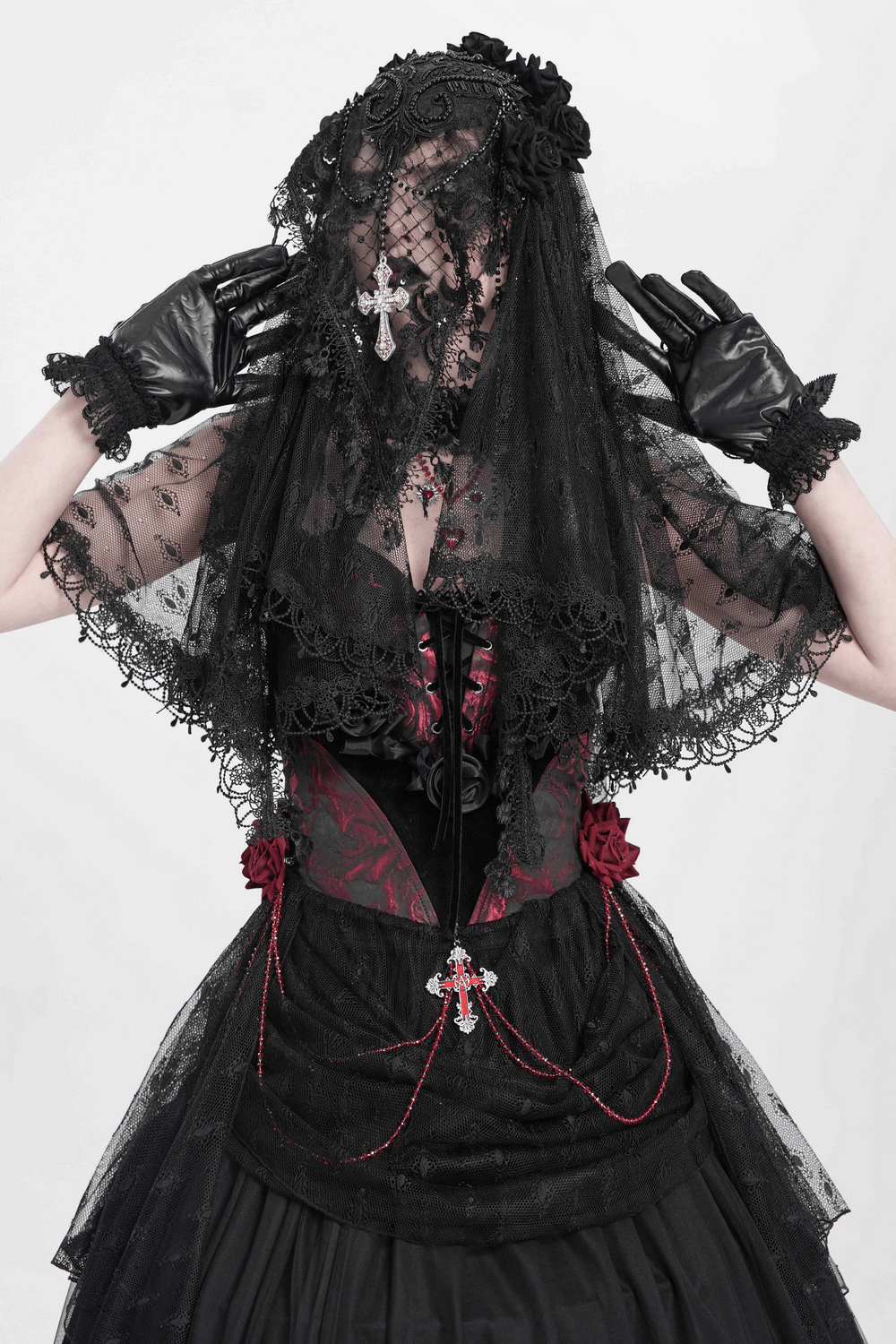 Elegant black lace veil with flower details and cross pendant, perfect for gothic or vintage-inspired outfits.