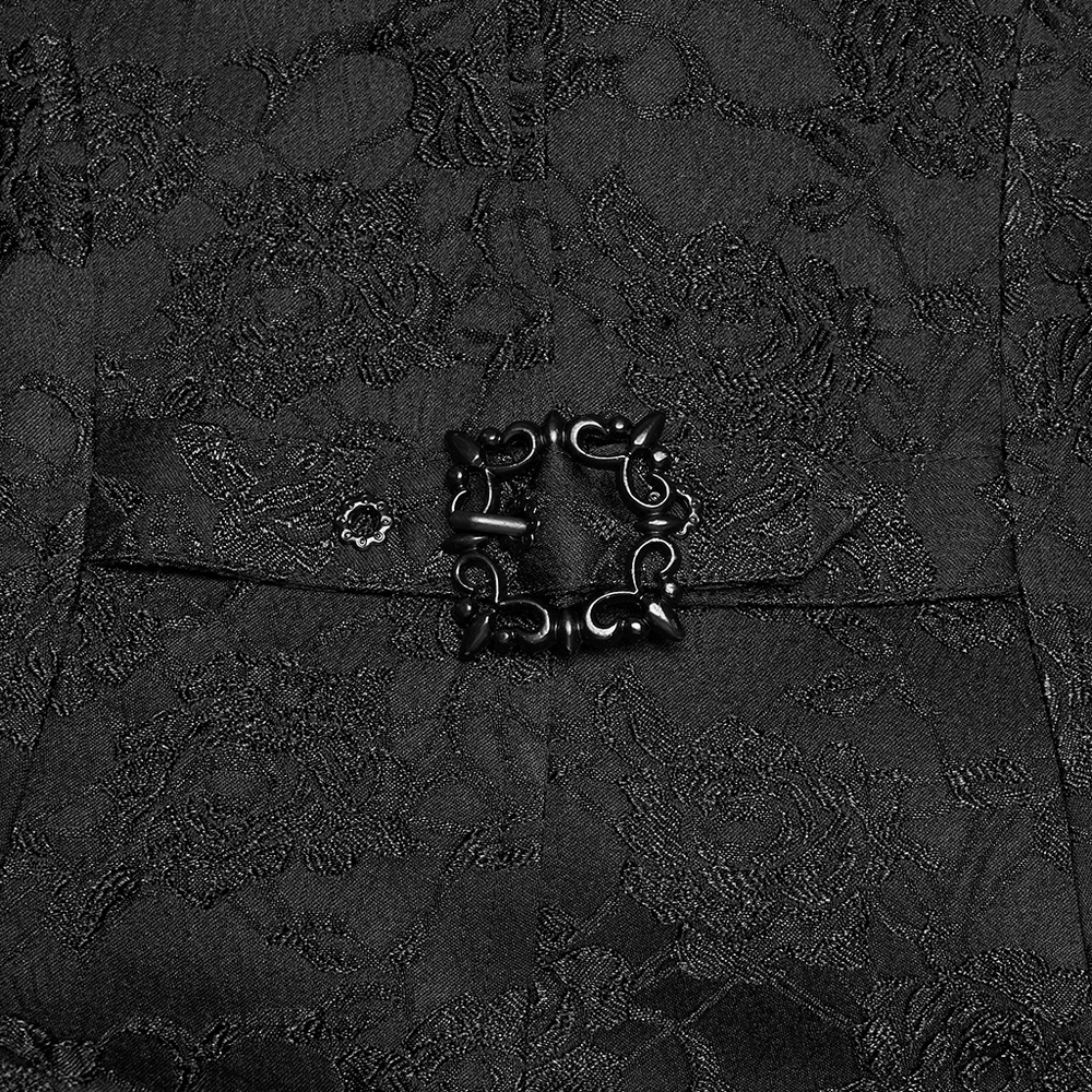 Close-up of Gothic Lace Vest with Layered Skirt and Ruffled Detail showcasing intricate black lace and decorative buckle.