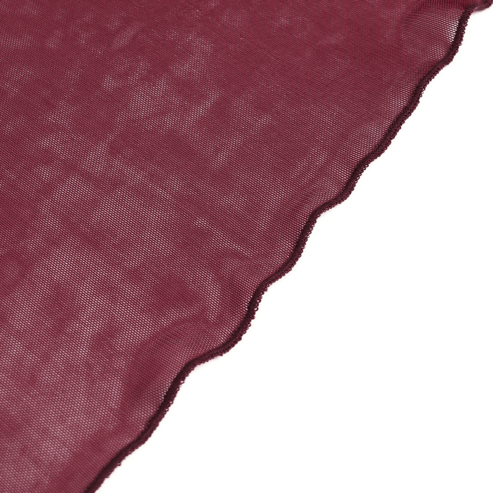 Close-up of deep wine red lace fabric with scalloped edges, perfect for gothic-inspired designs.