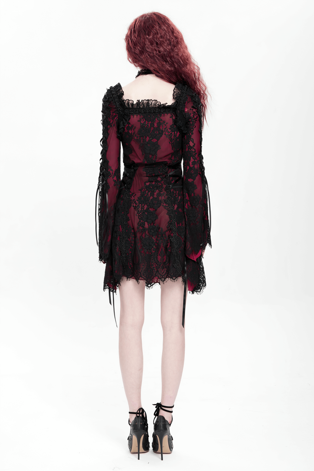 Back view of a gothic lace wine red and black long sleeve mini dress with flared sleeves and lace details.