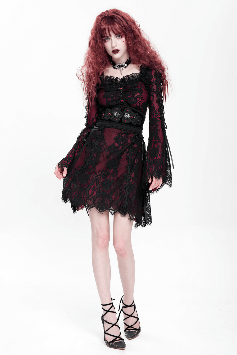 Model wearing a Gothic lace wine red and black mini dress with flared sleeves and lace-up details.