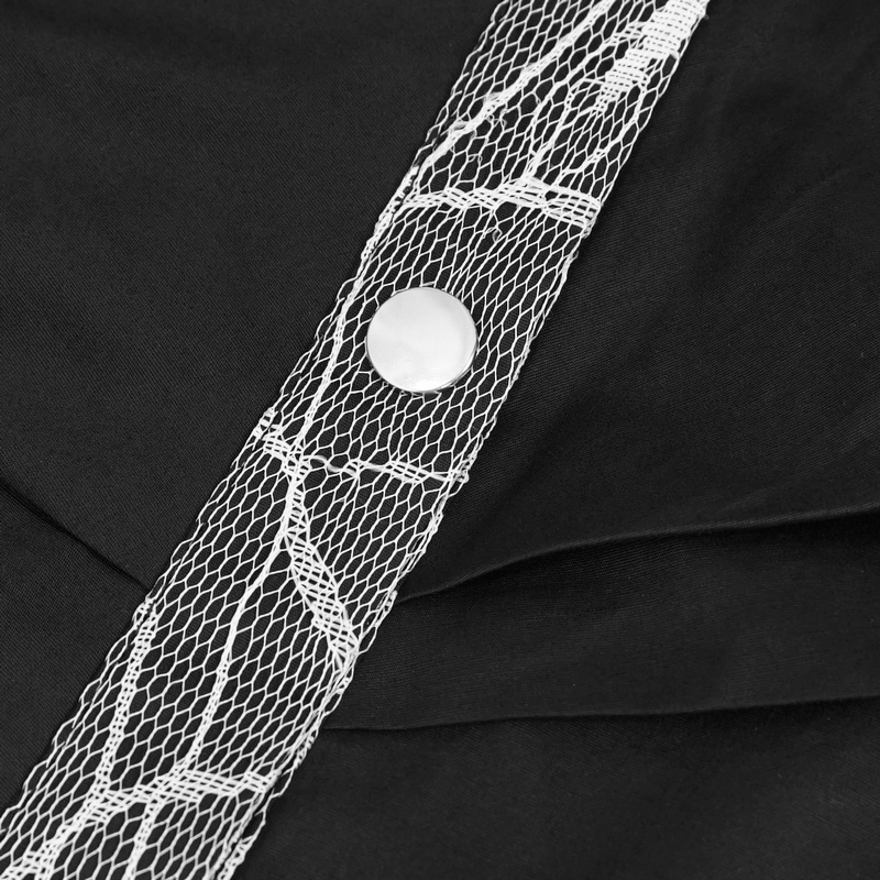 Close-up of black elongated women's shirt featuring white netting and a stylish button detail.