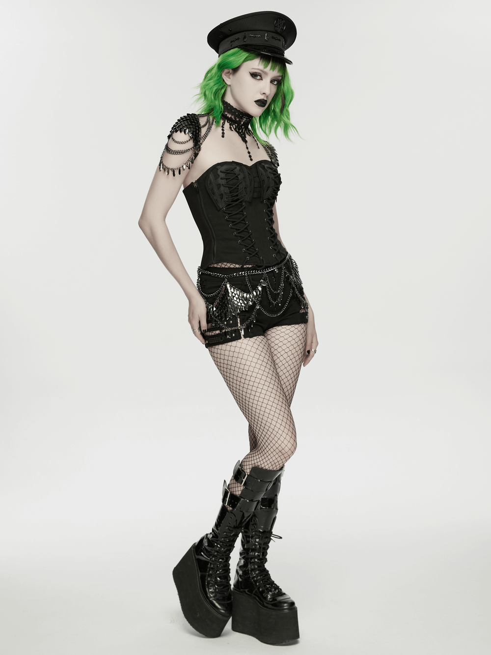 Alt Tag: Gothic Layered Metal Waist Chain with Blade Charms on punk model in black corset and fishnets, layered chains and blade accents