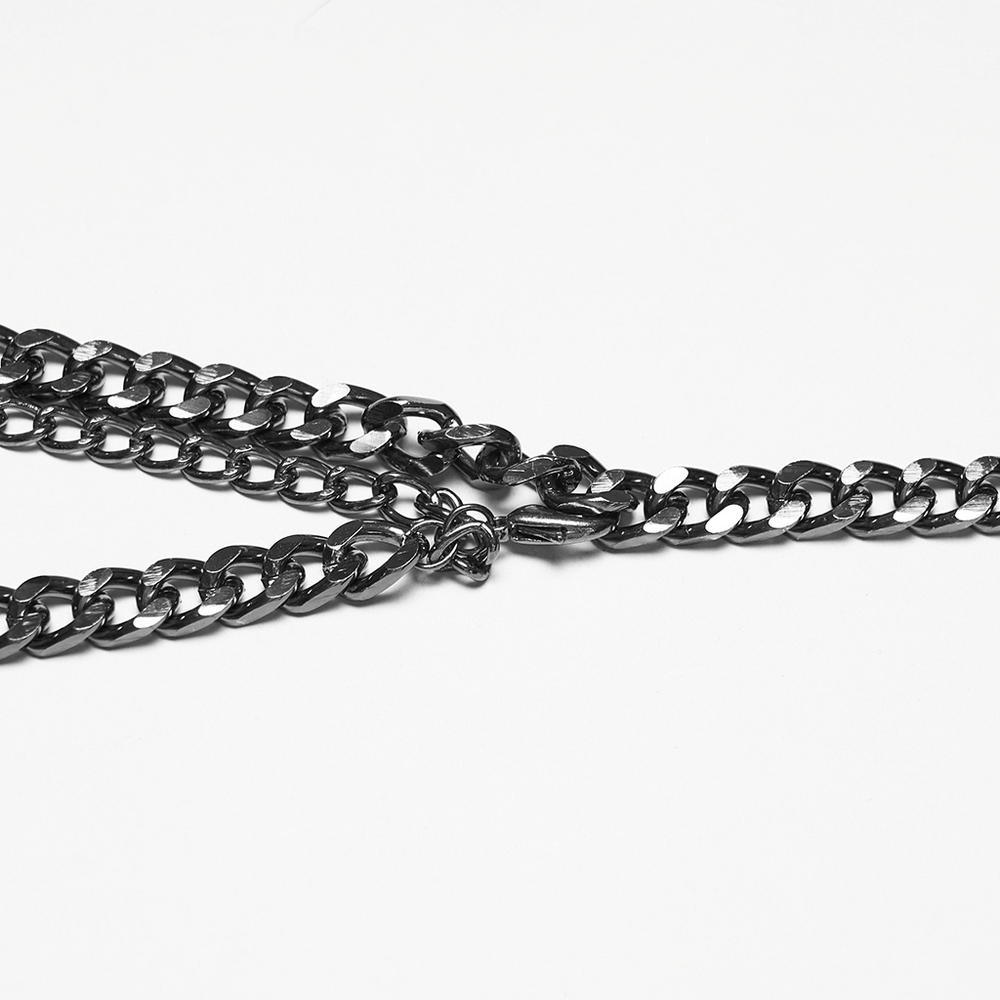 Alt Tag: Gothic Layered Metal Waist Chain with Blade Charms close-up of layered dark metal curb chains and clasp, punk body jewelry detail