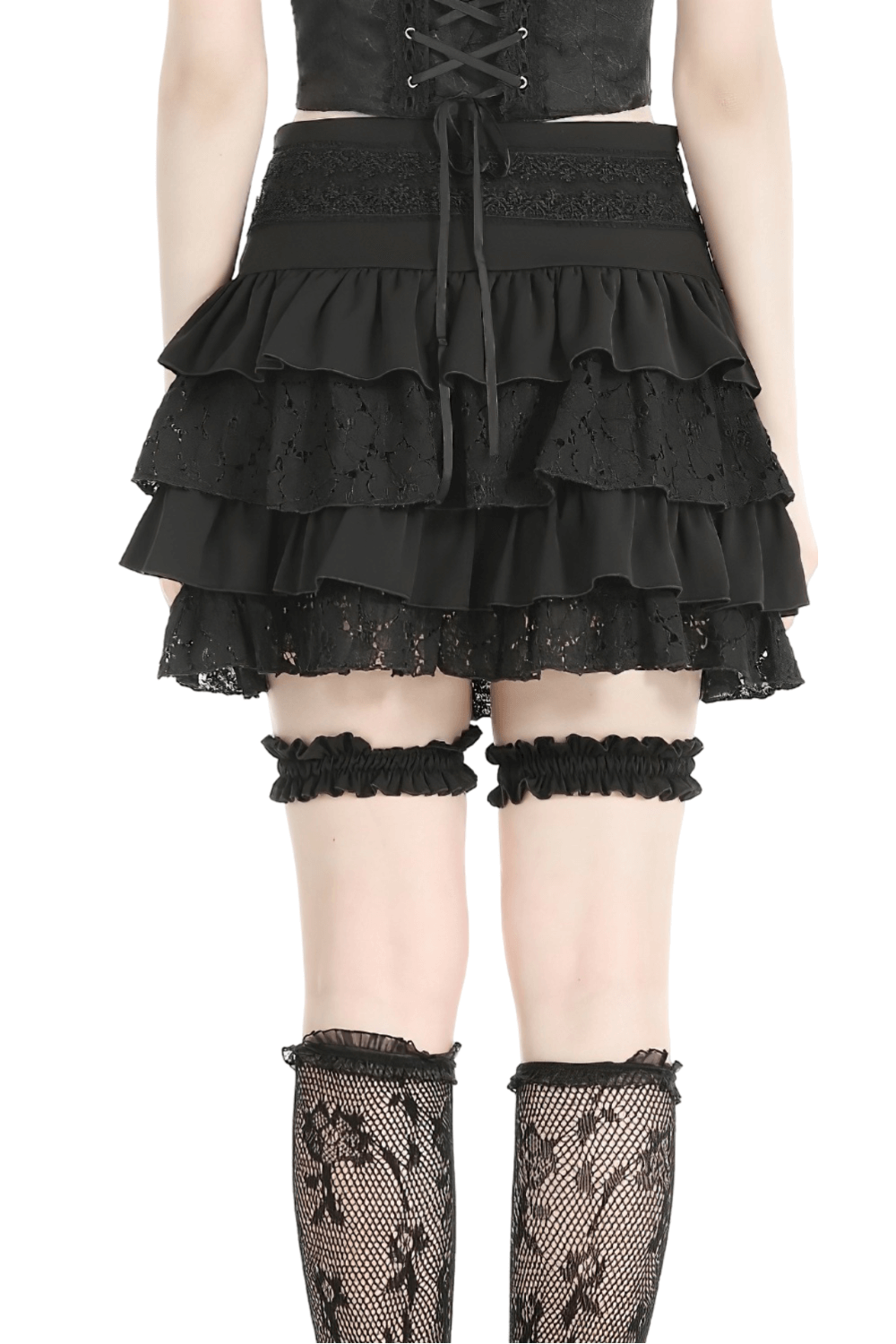 Black layered ruffle mini skirt with lace, belt, and garters, perfect for a gothic style look.