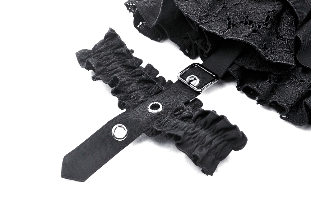 Close-up of black lace ruffle mini skirt belt with garter details, perfect for gothic style outfits.