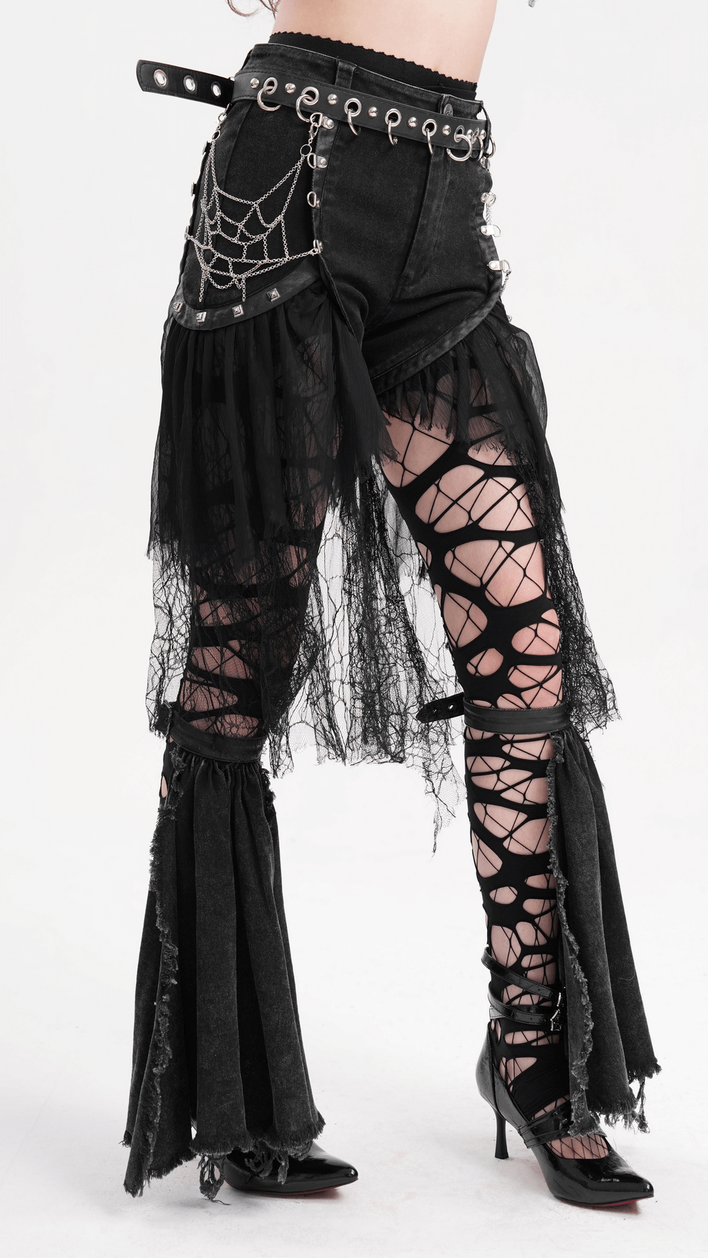 Gothic layered shorts with tulle and chains, featuring edgy design and lace trim for a punk-inspired look.