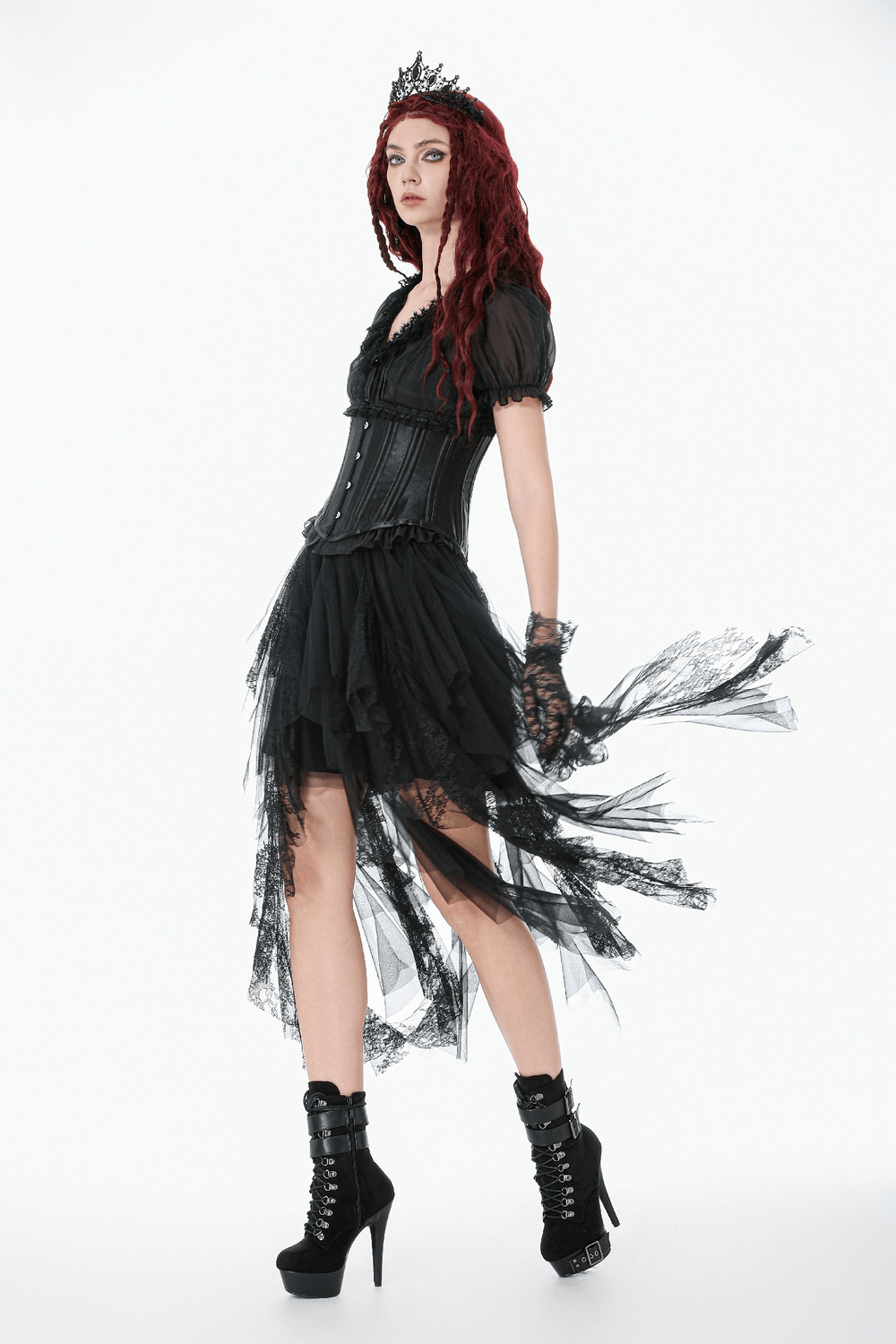 Gothic Layered Tulle Skirt with Asymmetrical Hem modeled by a dark-haired model with a crown and lace details.