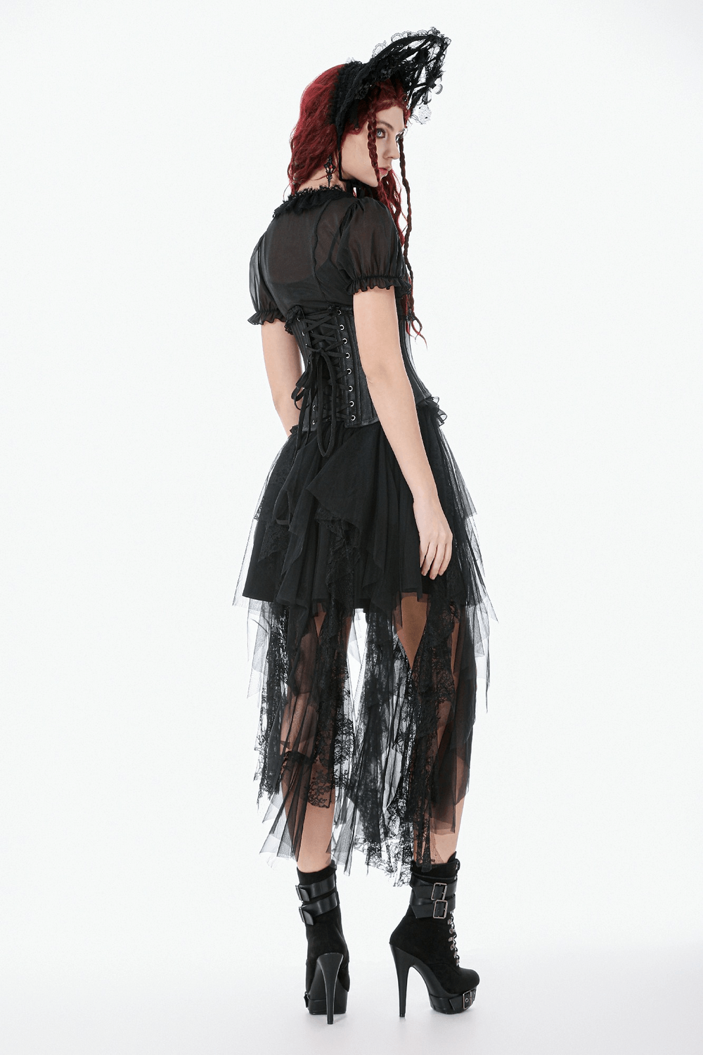 Gothic Layered Tulle Skirt with Asymmetrical Hem worn by model showcasing edgy dark style.