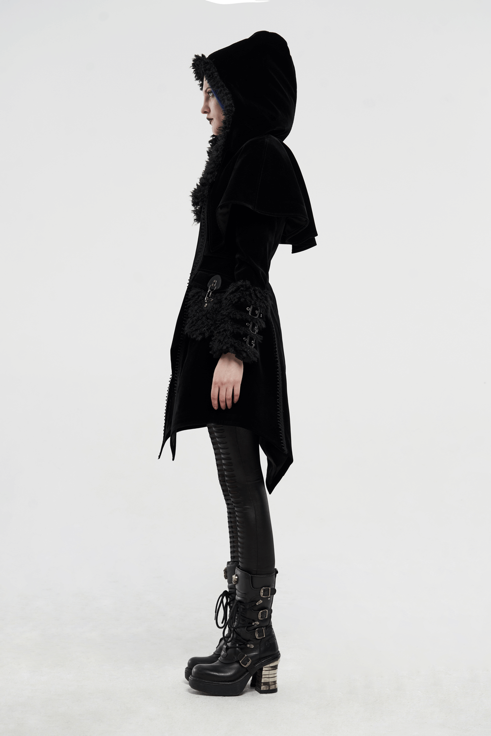 Gothic layered velvet cloak with faux fur trim, showing elegant design and edgy style, paired with stylish black footwear.