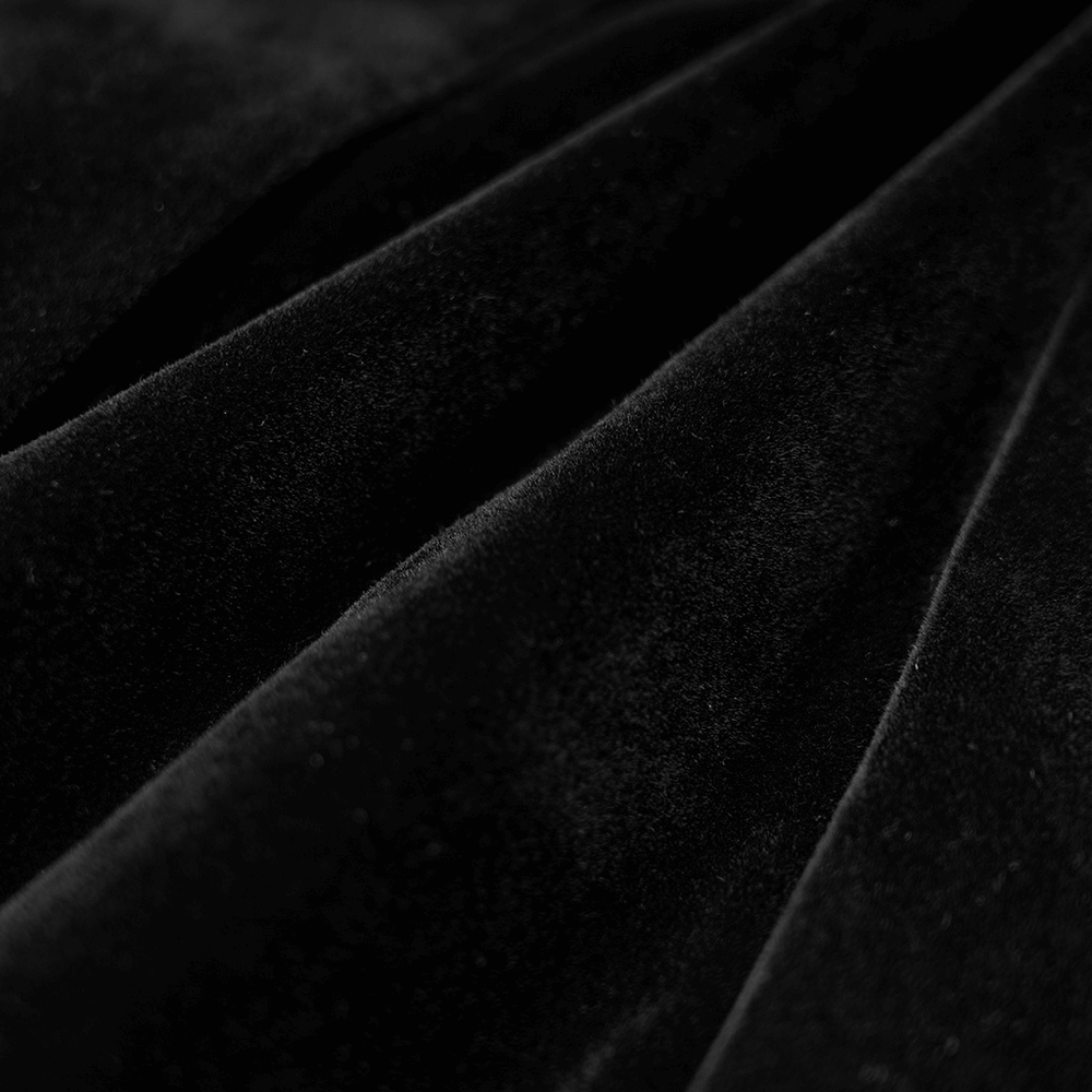 Close-up of luxurious black velvet fabric showcasing its rich texture and depth for a Gothic cloak design.