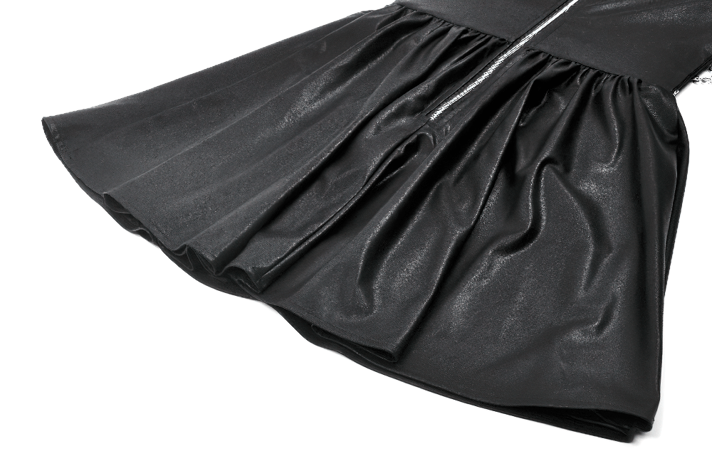Close-up of a gothic leather dress featuring a flared skirt, chain details, and a sleek zipper back.