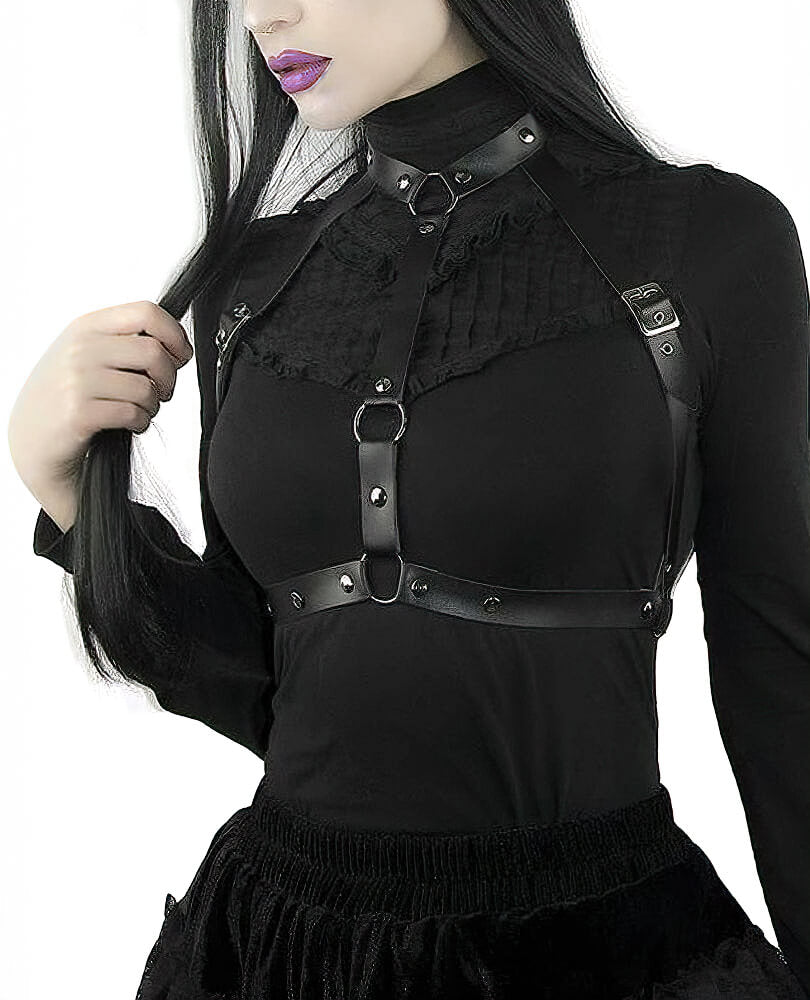 Gothic leather lingerie harness for women, featuring black synthetic leather and metal accents, stylish and edgy accessory.