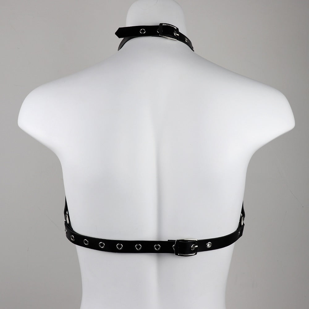 Back view of a Gothic leather lingerie harness for women, featuring metal rings and adjustable straps.
