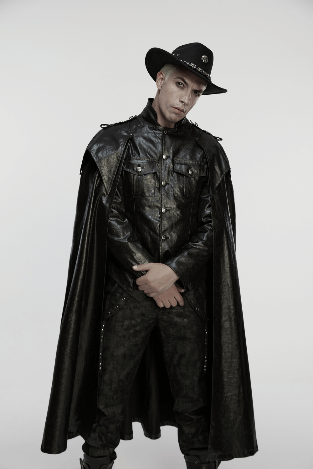 Gothic Leather-Look Military Shirt-Cloak With Metal Details modeled by a man wearing a hat and confident pose.