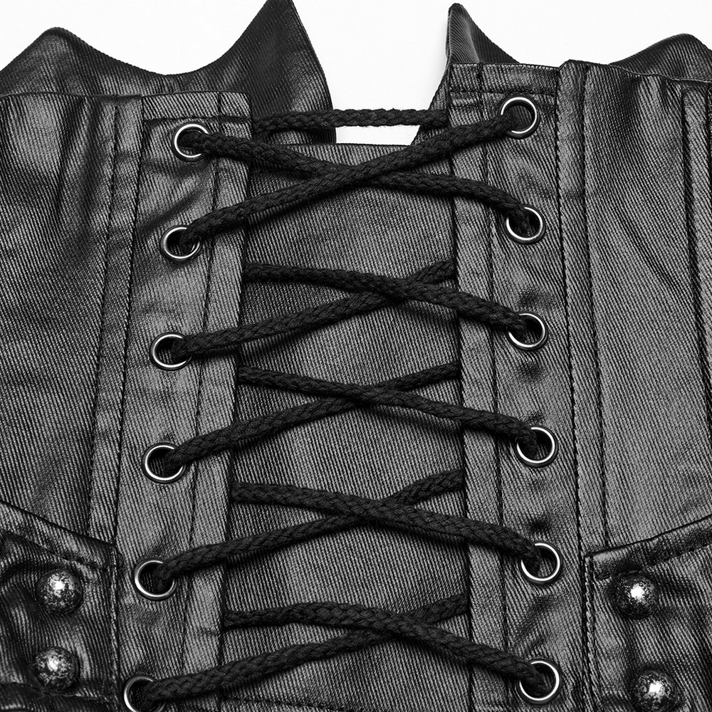 Close-up of gothic leather corset with intricate lace-up detail and sharp designs, perfect for punk or Victorian goth fashion.