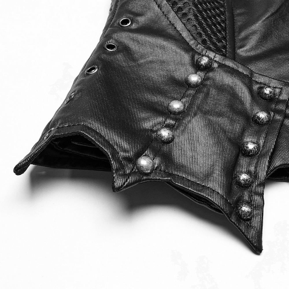 Close-up of a gothic leather corset featuring semi-circular studs and mesh panels, showcasing punk style.