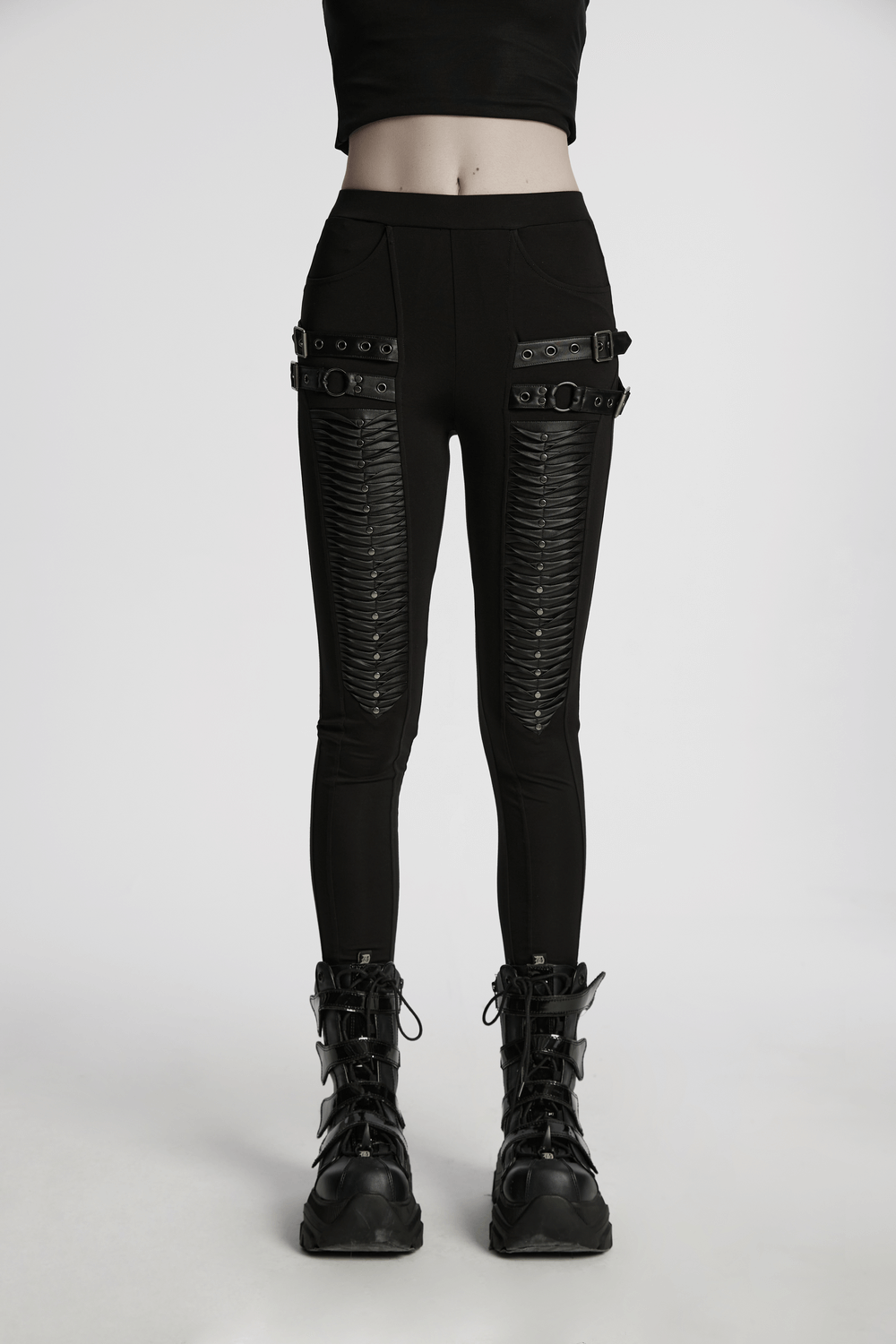 Gothic leggings with 3D pleats and faux leather straps, perfect for edgy fashion lovers.