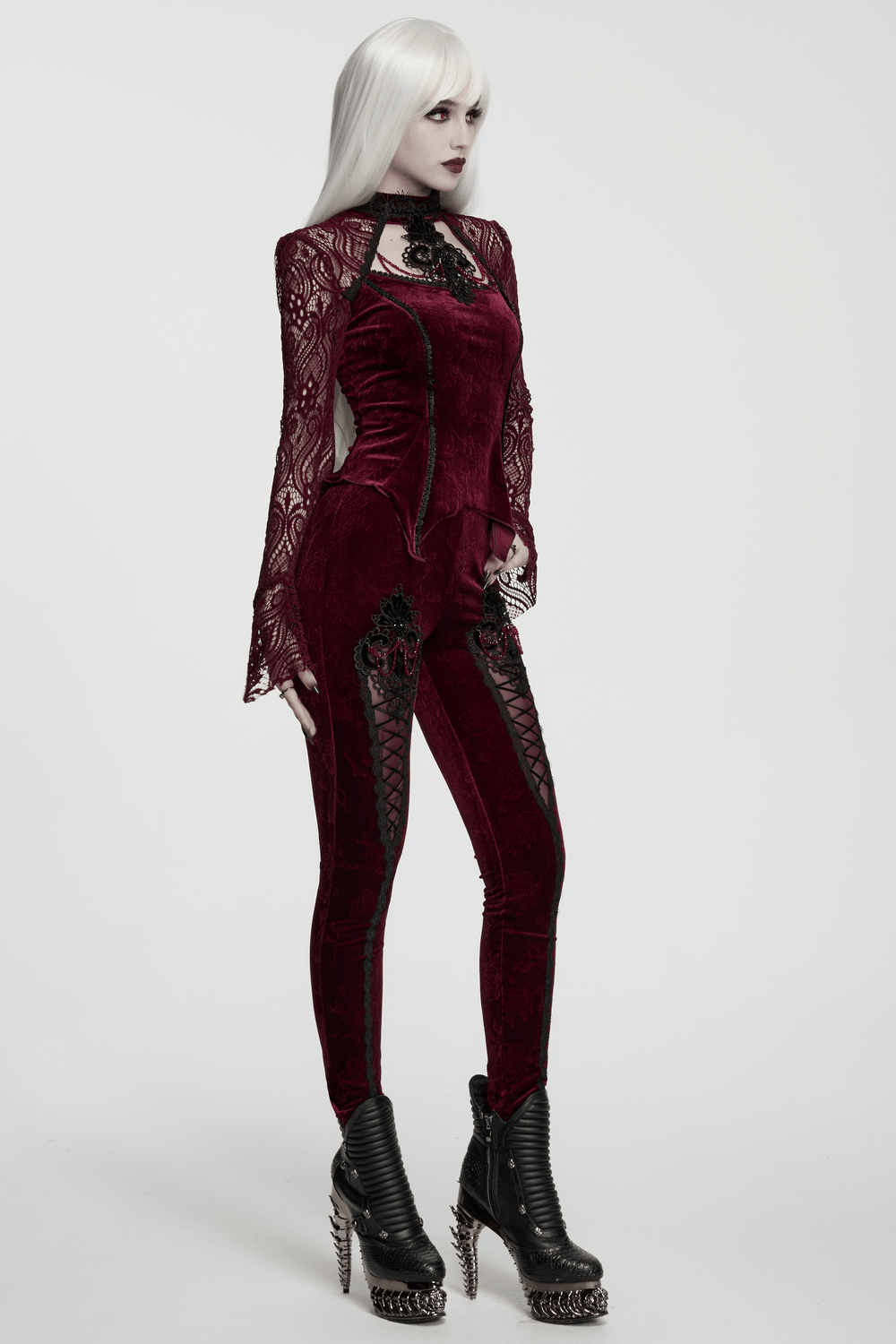 Gothic Leggings with Black Lace and Crystal Pendant styled with a gothic outfit, elegant and edgy.