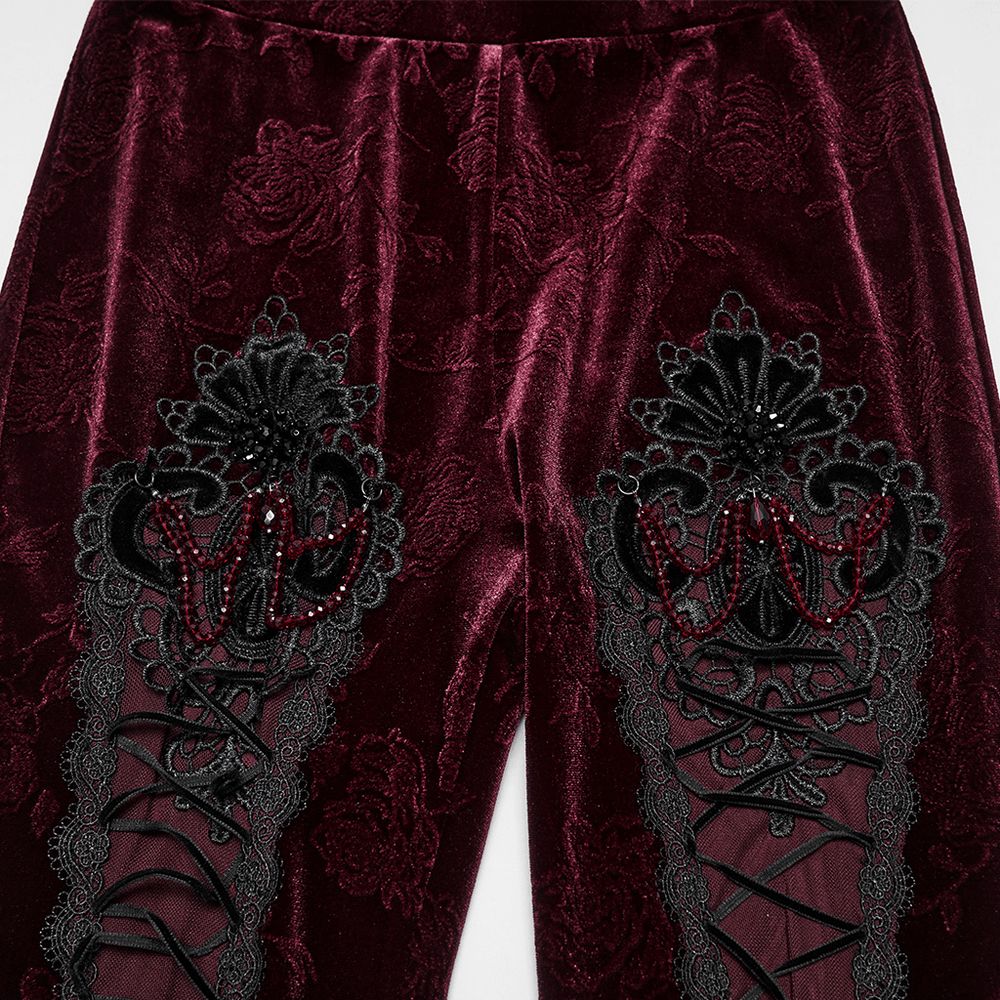 Gothic Leggings with Black Lace and Crystal Pendant showcasing intricate designs and rich burgundy fabric.