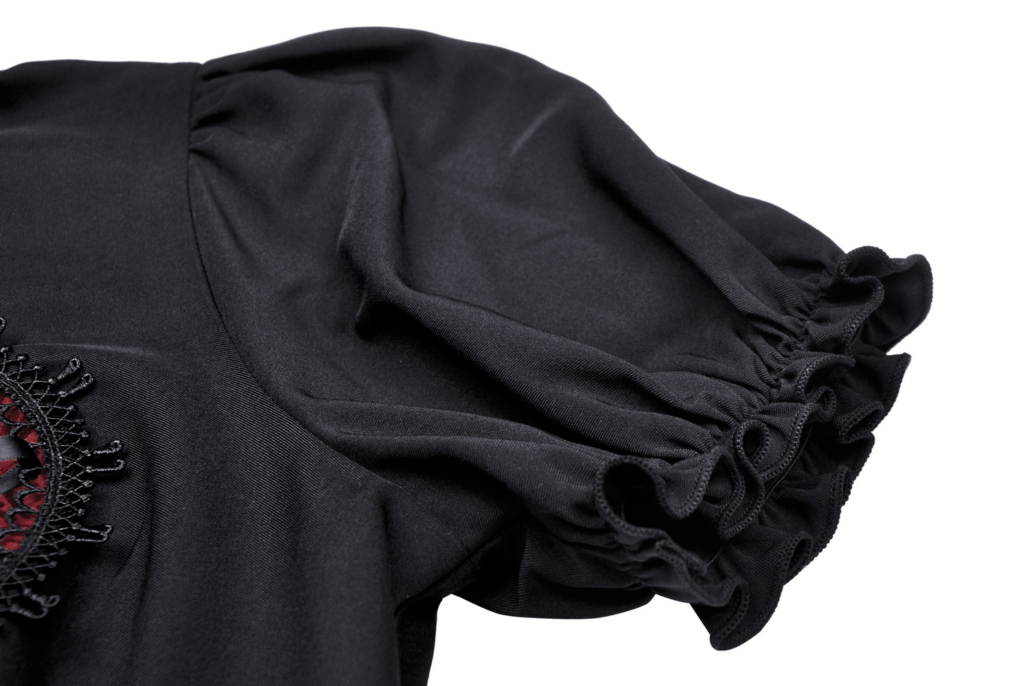Close-up of the Gothic Lolita black dress featuring puffed sleeves and intricate red heart detail.