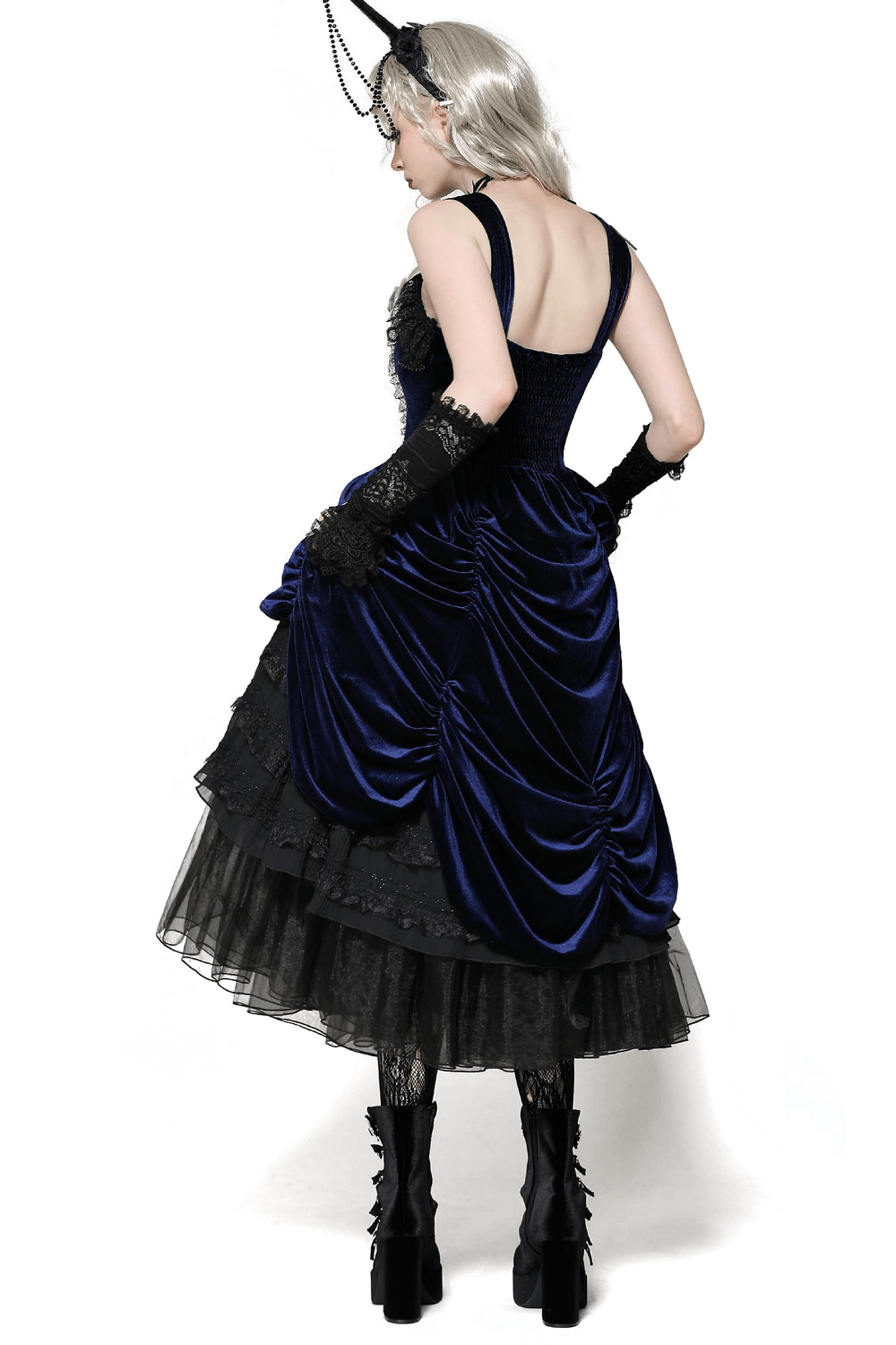 Elegant Gothic Lolita dress in navy velvet, featuring ruffled lace skirt and adjustable straps, perfect for vintage style enthusiasts.