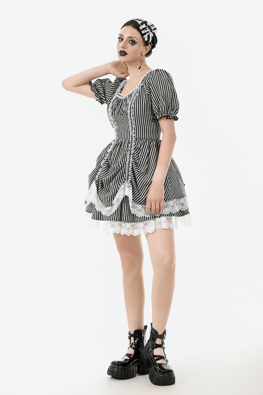 Gothic Lolita mini dress with puff sleeves, black and white stripes, lace trim, and bow-tied back, perfect for retro dollcore style