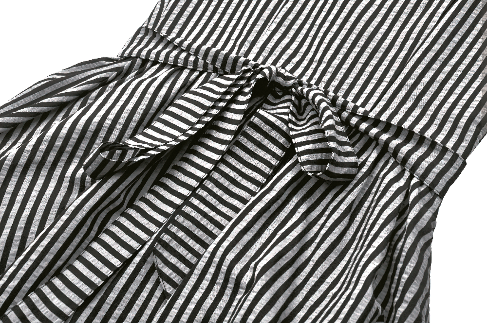 Gothic Lolita striped dress with puff sleeves and bow detail, showcasing vintage charm in black and white stripes.