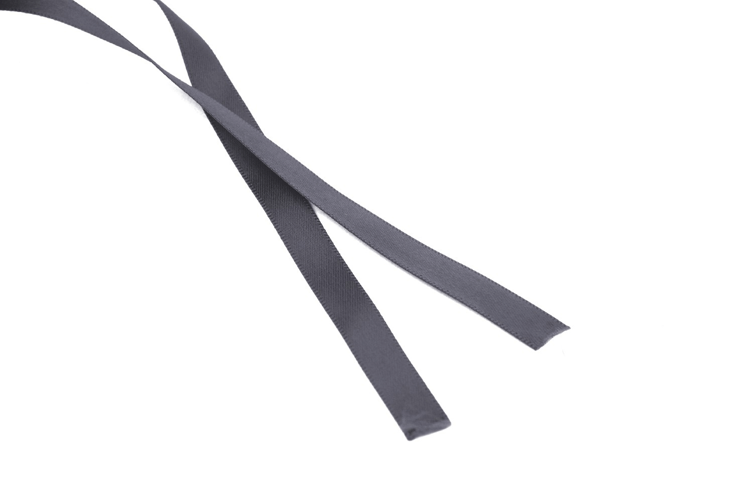 Close-up of dark gray fabric ribbons, perfect for embellishing Gothic clothing or accessories.