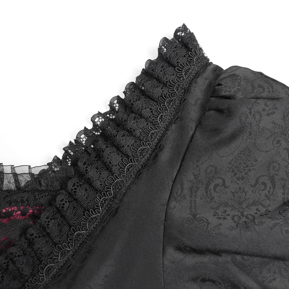 Close-up of Gothic lace details and ruffled neckline on a black and wine red medieval dress.