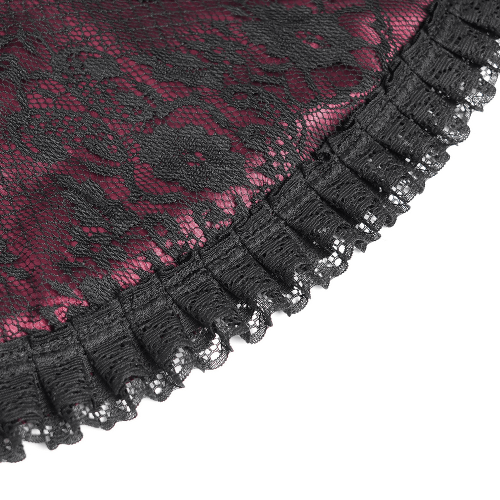 Close-up of black lace with wine red underlay and ruffled hem, perfect for gothic and medieval-inspired fashion.