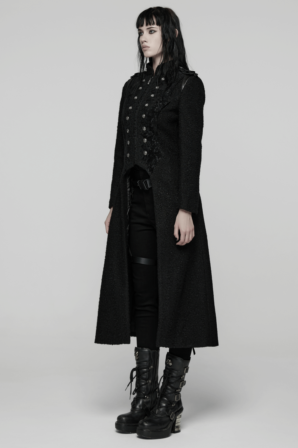 Gothic Long Black Double-Breasted Woolen Coat showcased on model, featuring lace trim and ram head skull rivets.