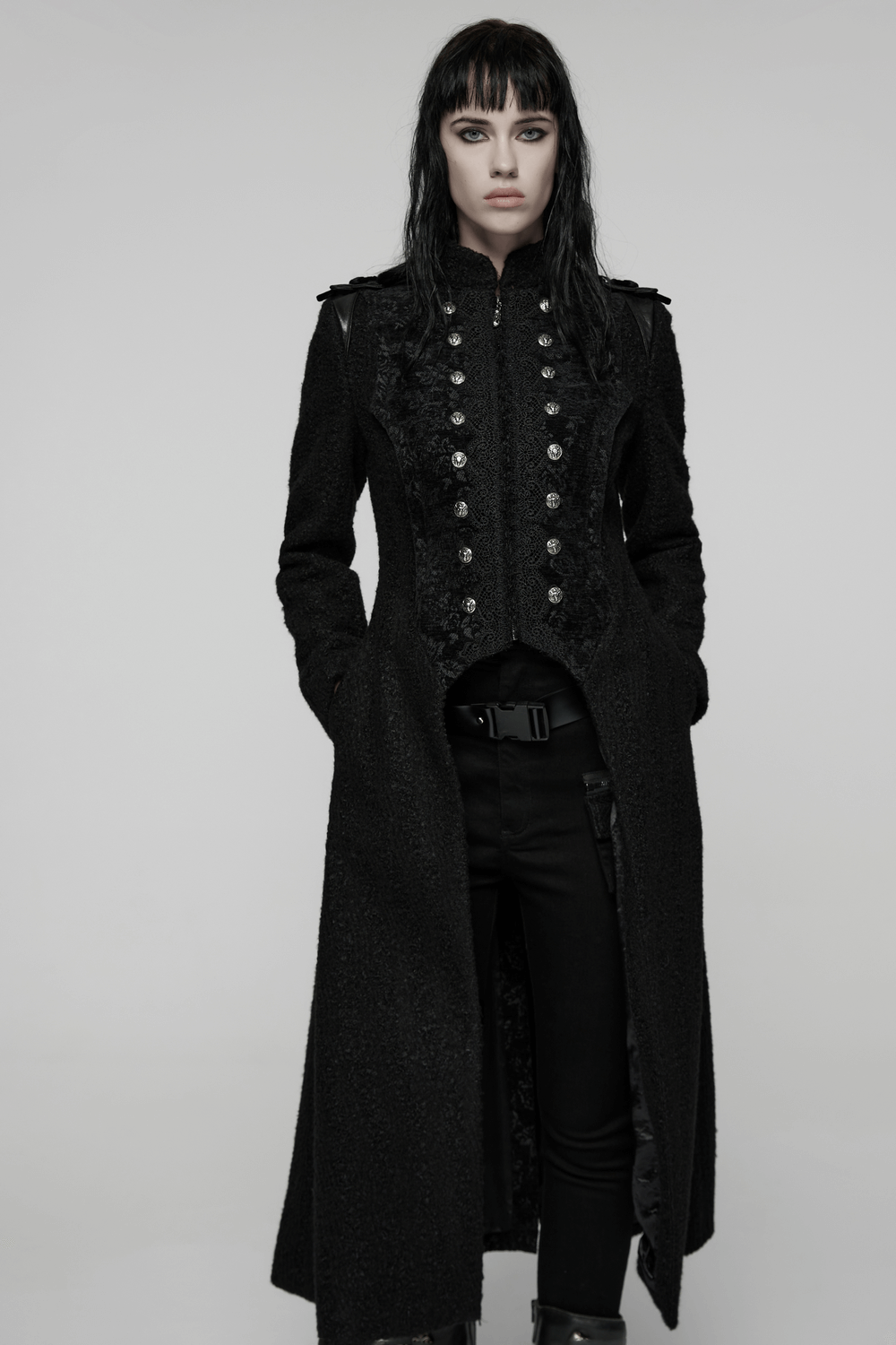 Gothic Long Black Double-Breasted Woolen Coat with lace trim and ram head skull rivets on model.