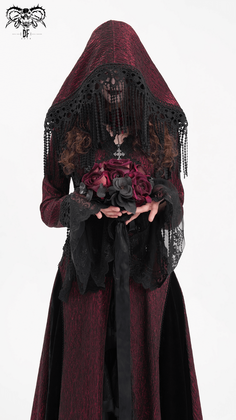 Gothic long cape with hood and lace details, featuring a model holding dark roses, embodying Victorian-inspired elegance.